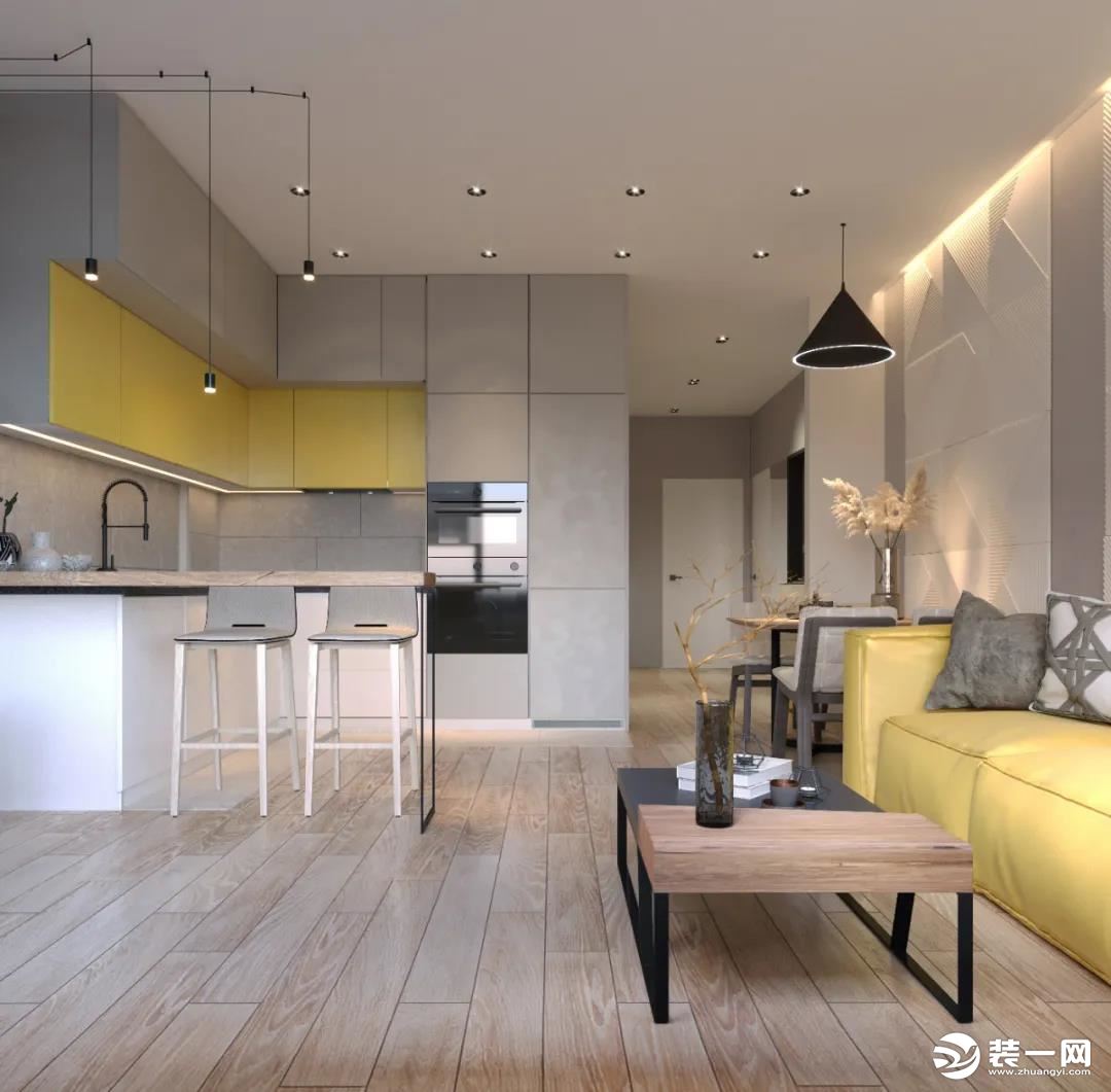设计师将厨房，餐厅和客厅合并为一个明亮的空间。