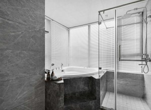 卫生间是简约的黑白灰搭配.给宽敞的空间定制了浴缸和淋浴房.让业主能够更好的享受生活