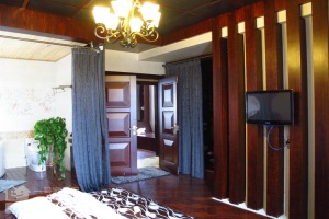 武汉盛世家园180平四居室东南亚风实景案例主卧柜子