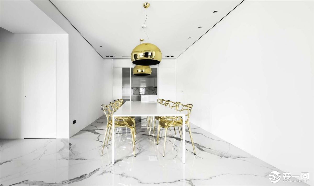 餐厅延续客厅的风格设计，宽敞空旷的空间，以白色为主，金色为辅的搭配。