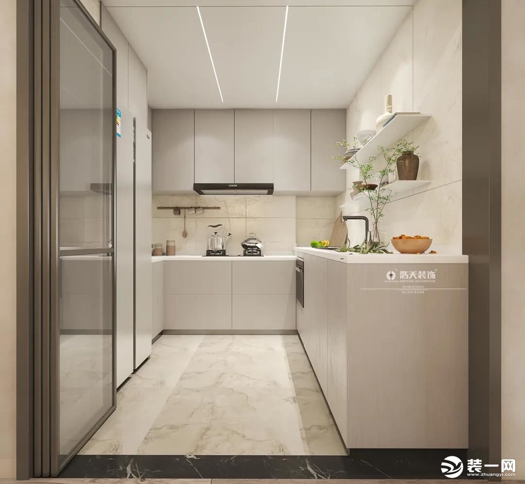 厨房整体以暖白色为主，透明的折叠式门，使餐厨空间保持了某种联系，视野更加开阔。