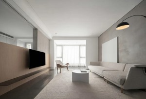 客厅无主灯设计，在整体色彩上应用了石材的黑、顶部的白、微水泥的灰为基调