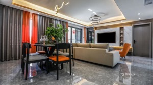 餐厅与客厅相连，设计师在餐厅搭配橘色与灰色调的窗帘融入一丝纯粹的意蕴，通过色彩与材质来营造空间的整体