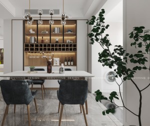 餐边柜设计，餐桌与沙发相呼应，让整个空间更加的整体，典雅的挂画与绿植形成对比点缀着空间。
