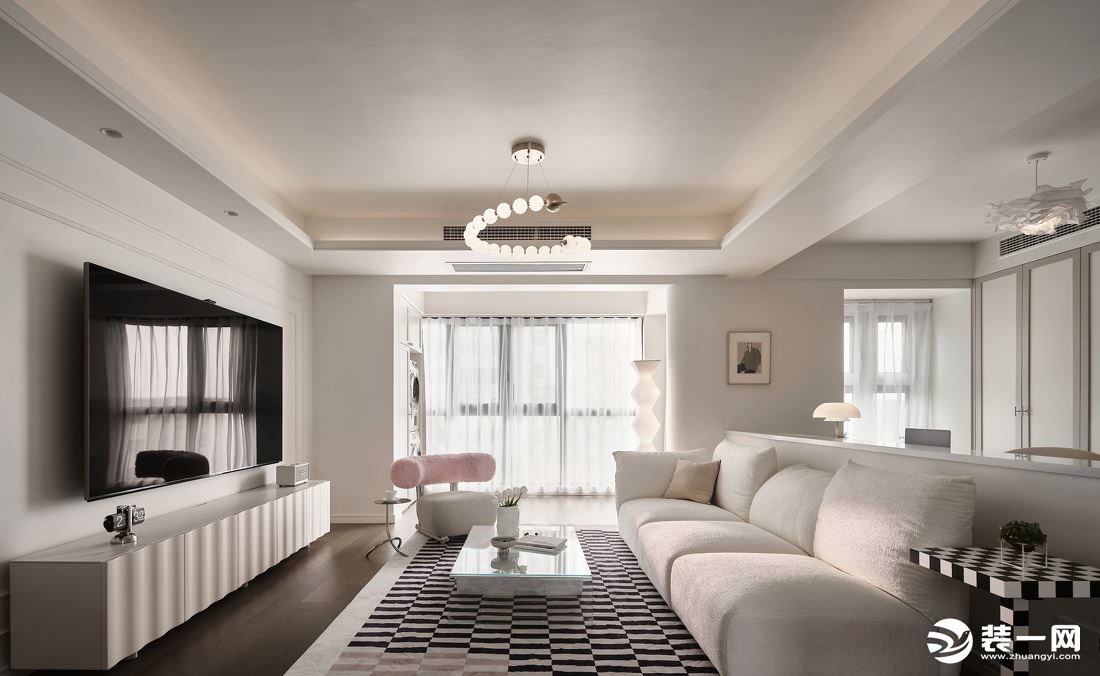 客厅空间以温润的奶白色为主色调，将现代风格与法式元素相融合，打造出温柔治愈又有高级感的家居空间。客厅