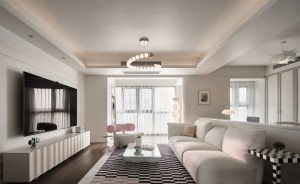 客厅空间以温润的奶白色为主色调，将现代风格与法式元素相融合，打造出温柔治愈又有高级感的家居空间。客厅