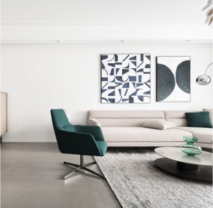 客厅大面积的白配以简洁的软装，电视背景石材搭配木饰面，使整个空间十分纯粹。