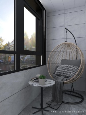 侧边还定制了一个收纳柜，黑框窗户与吊椅色调一致，呈现出一种简约舒适而自然的氛围。