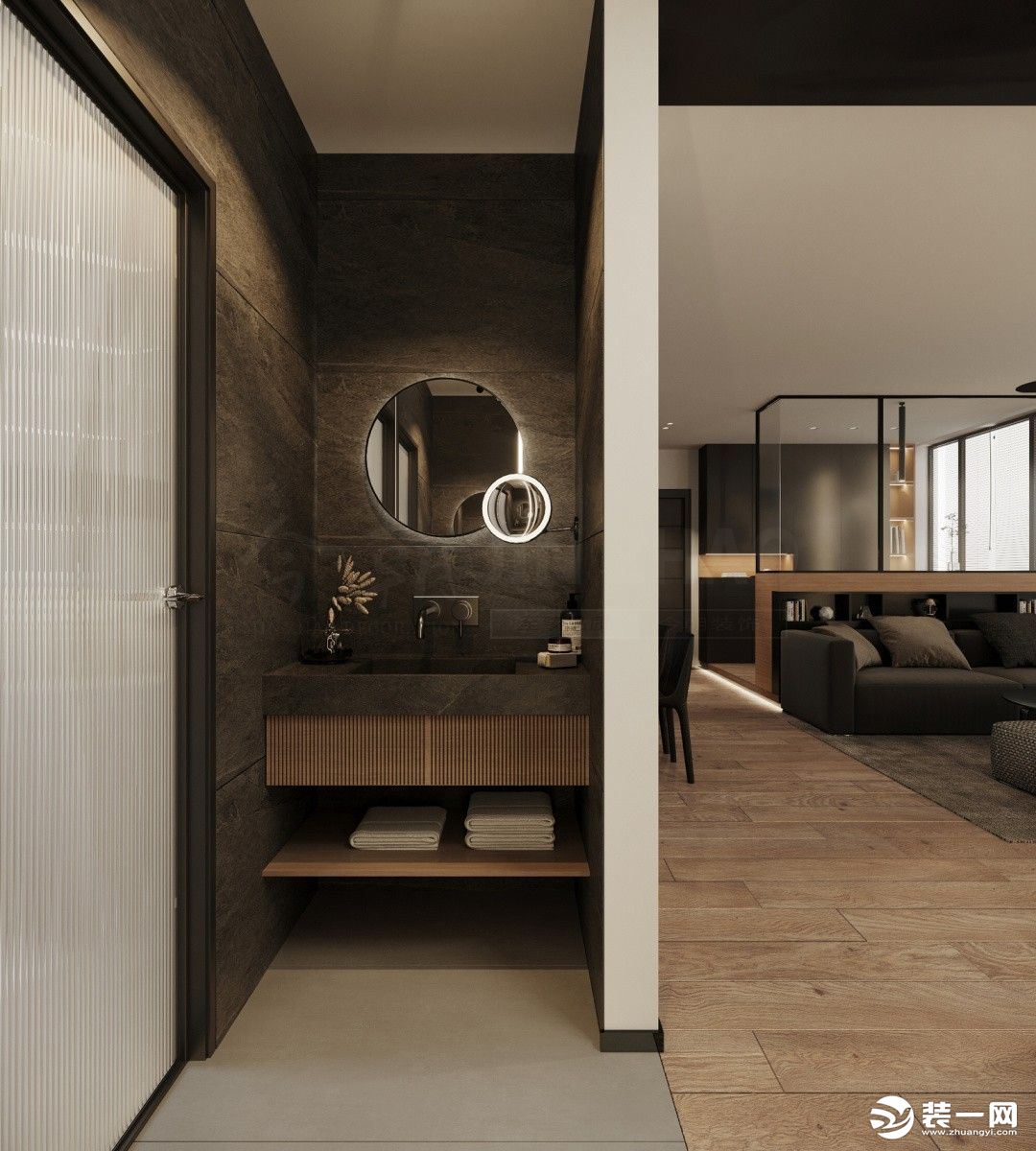 洁白简单的空间，没有多余的装饰，给人的是一种优雅干净的气息，大白墙的氛围下，摆有灰色沙发，黑色茶几，