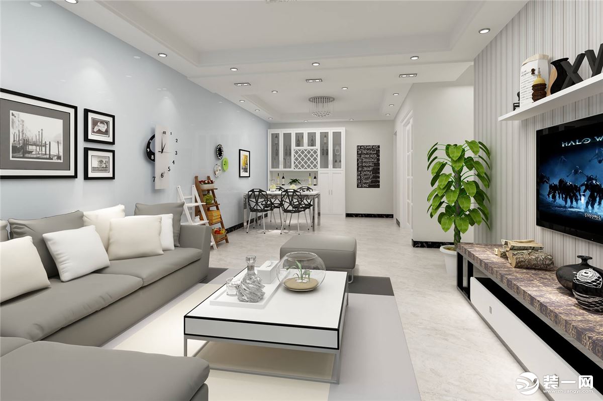 客厅的设计延续了一贯主张的简约美学，沙发的线条将茶几和电视柜的硬朗感变得柔和，设计构思严谨而优雅。