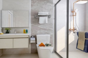 卫生间采用干湿分离的形式。洗漱区用半透明玻璃隔开，不仅能保证室内的采光，还能延伸空间的视觉感。