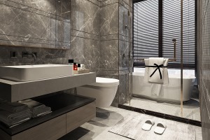 主卫采用干湿分离的布局，完美融入浴缸提升洗浴舒适度。深灰色壁面以及浴室柜延续了整体空间的基调。