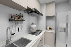 厨柜的色调上选米黄色，感觉很亲切，添加吊柜便于储物，L型的布局设计动线统一流畅，方便操作。