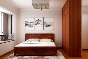深木色的床、衣柜，搭配简约的挂画，让整个空间简洁又富有韵味。