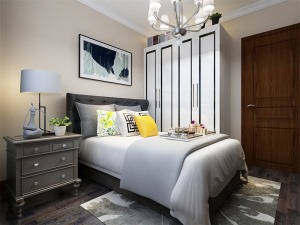臥室墻面放置掛畫，配有現代感十足的白色衣柜