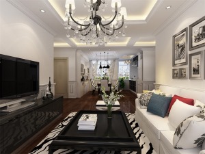客厅采用了黑白灰为主色调，加入其他的颜色进行搭配，使空间不暗沉，很有活力，家具的选择是以硬线条为主