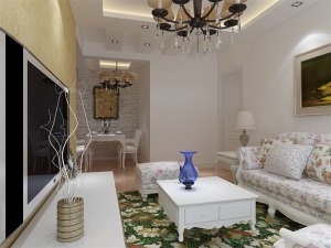 客厅采用简单的回字形吊顶，镶以筒灯，营造出简洁且高雅的氛围；采用粉色碎花的欧式家具，沙发背景墙整体采