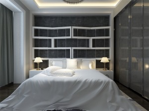 灰色的玻璃门衣柜搭配白色的床品，让整个空间更具现代与时尚感。