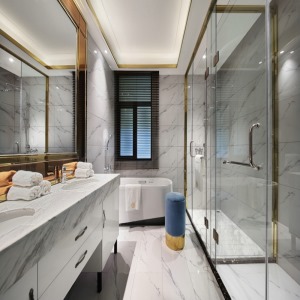 卫生间以灰白色石纹磁砖为主体，令卫生间显得更加干净整洁，内部空间纹理和谐淡雅。细腻的白砖卫具搭配艺术