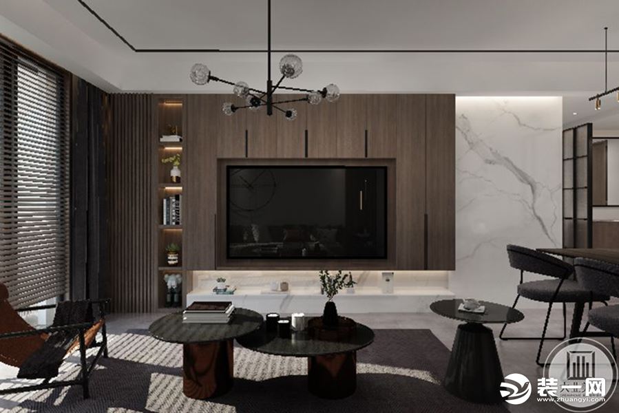 布置简洁，客厅的以黑白灰为主调，展现一个休闲的氛围。休闲的灰色沙发配合橙色的软垫，展现出和谐宁静的家