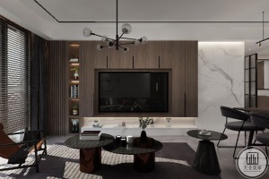 布置简洁，客厅的以黑白灰为主调，展现一个休闲的氛围。休闲的灰色沙发配合橙色的软垫，展现出和谐宁静的家