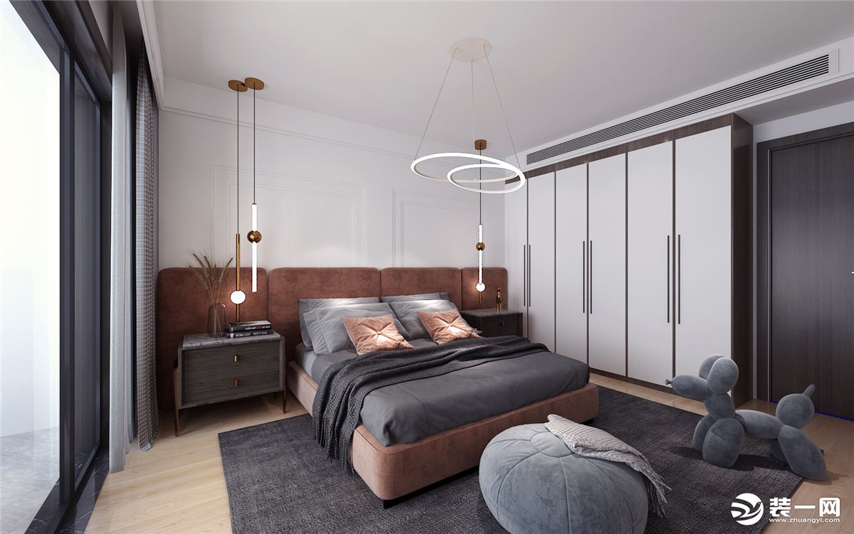 卧室作为休息的空间，舒适度为首要考虑，简洁大气，没有做繁杂的造型，棕色皮质的床、灰色的木地板搭配拼