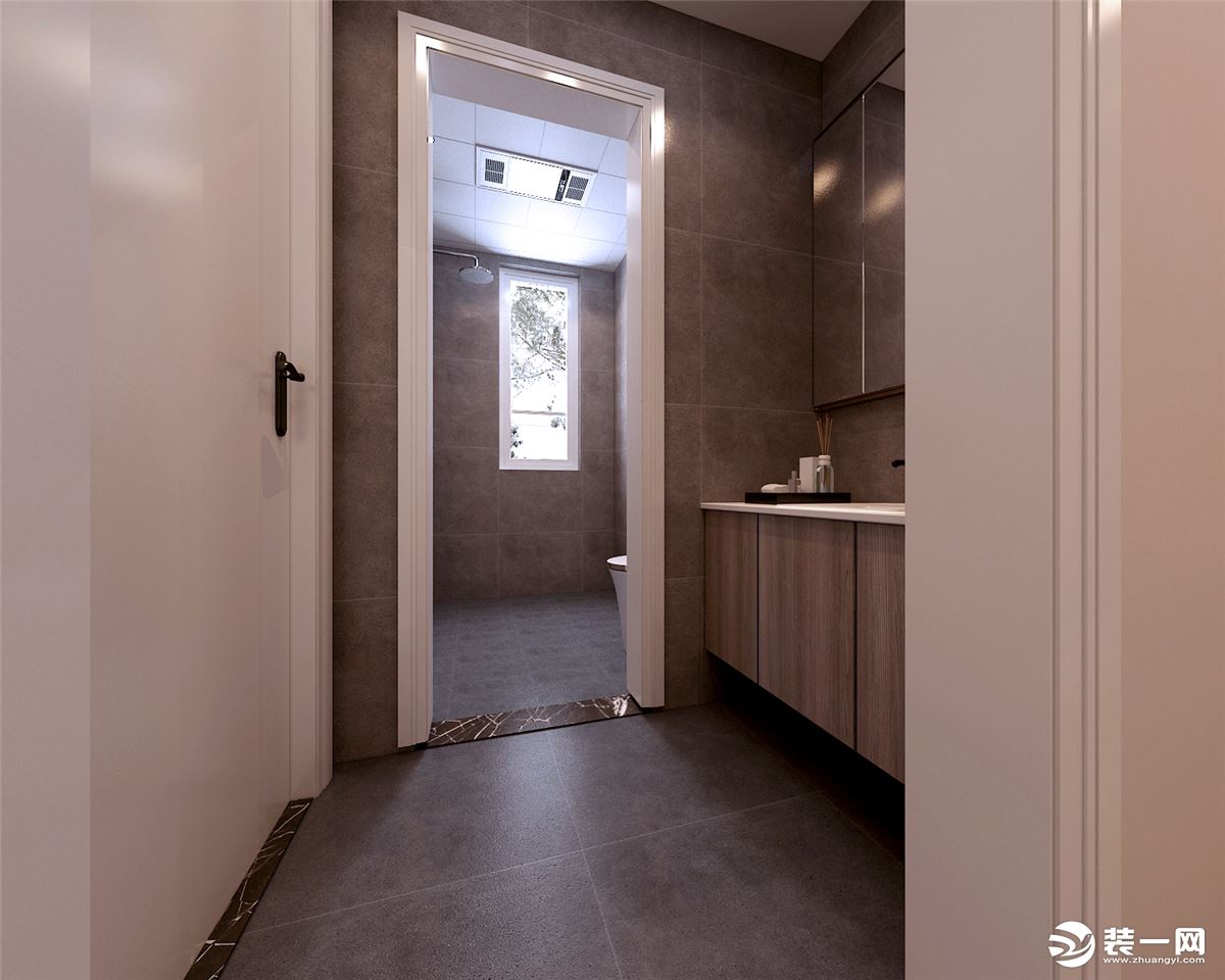 卫生间空间干湿分离设计，整体色调也采用了深色系，白色门套和墙地砖的结合，适感觉整体的空间一体化。