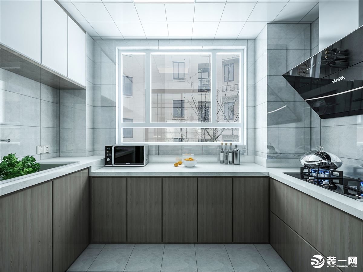 厨房做了U型橱柜的设计，最大化利用空间，采用灰色调瓷砖，地柜搭配深色地柜门板和隐形把手的结合。