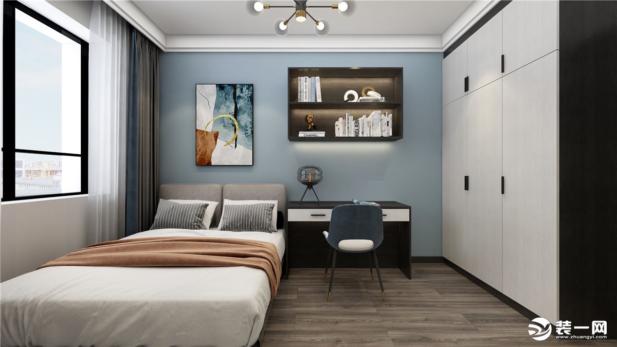 次卧室为男孩房，背景墙颜色为浅蓝色，增加空间的灵动性。