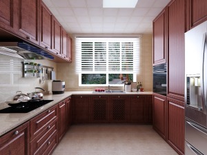 厨房采用L型的设计。旁边立体的柜子加上冰箱电器的内嵌，节省了空间，也增加了储物功能。