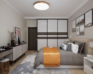 卧室还是以暖色为主，用简单的装饰画作为墙面设计，增添生活气息。1800*2600的衣柜可满足于两人的
