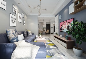 沙发墙采用简单的石膏线打造氛围，以灰色为主色调，搭配深蓝色系沙发，让空间简单又不单调，通过整体空间的