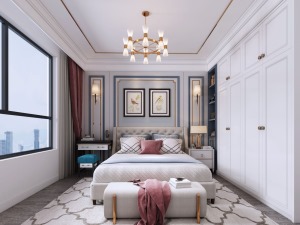 卧室整体采用暖色调。背景墙也使用了石膏线加上暖色的软装搭配，让整个墙面更加温馨舒适。