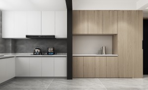 厨房的采光很好，墙砖选用了浅灰色，搭配欧派的阿拉斯加橡木橱柜，使厨房空间显得既明亮通透又有质感。