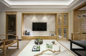 将客厅的自然都收纳在了墙面之上，精致的客厅沙发与木纹堂椅，房屋中的内饰都透露着精致的形状