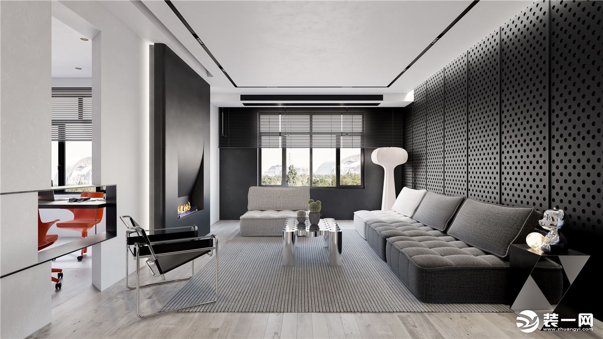 客厅灰色的沙发和地毯，作为白色吊顶和黑色穿孔板的过渡，给整个空间增添和谐、安宁的感觉。绿色的仙人掌赋