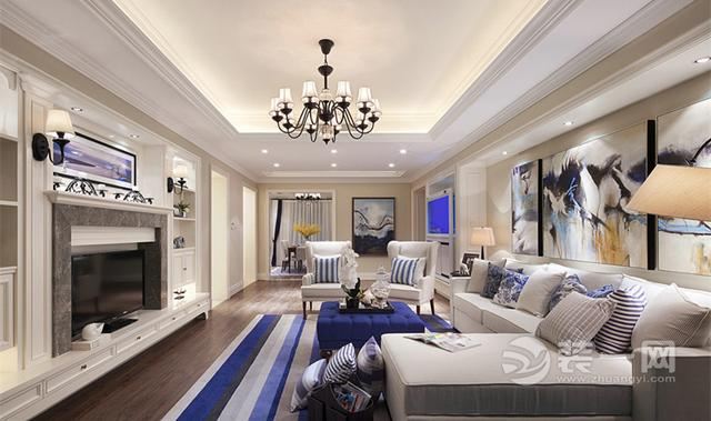客厅利用无侵略性的白色展开视觉空间的延伸及穿透，并运用空间的层次变化，创造出级丰富的空间