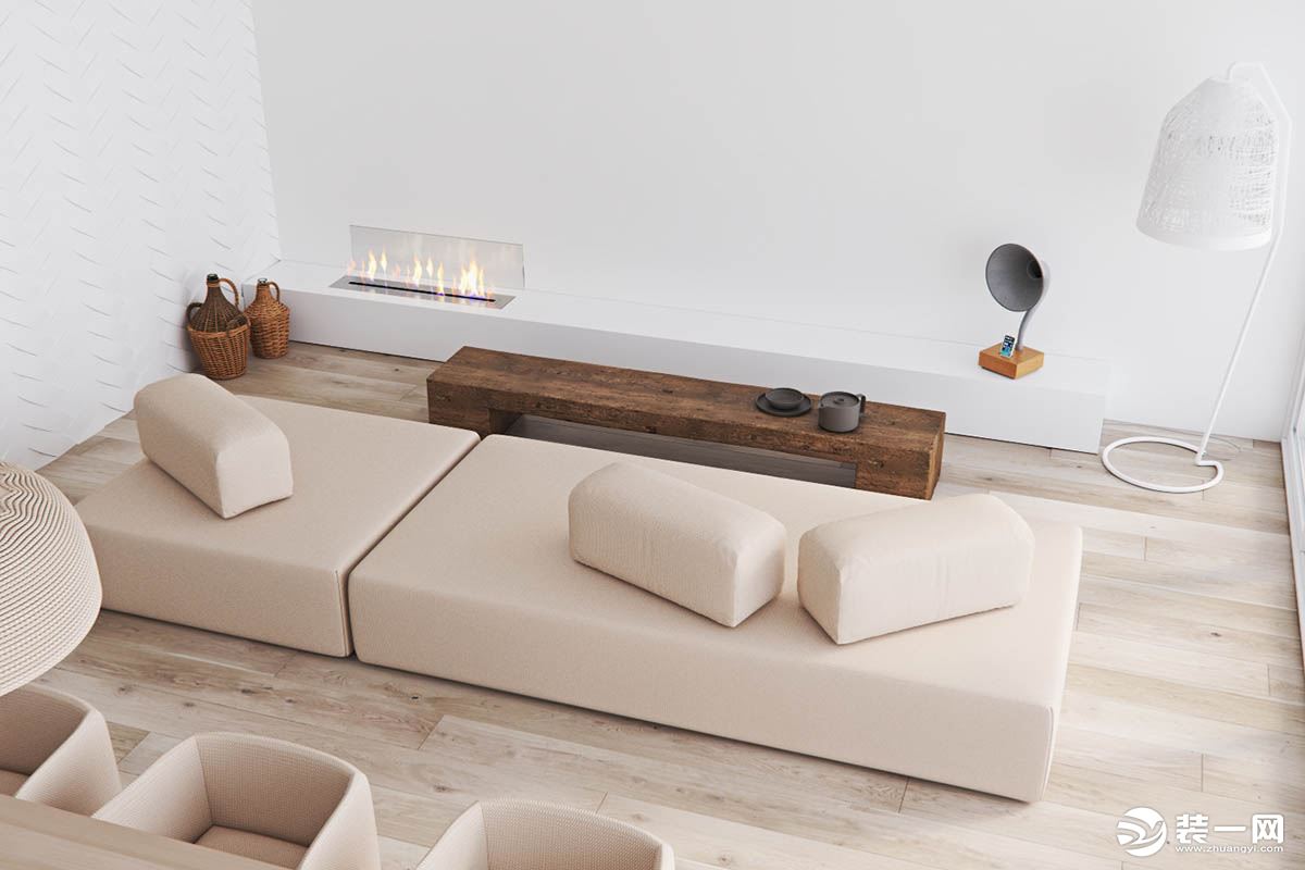 客厅简单没有过多的设计，米色的一字型布艺沙发，可以摆放的抱枕，可以随意的放松