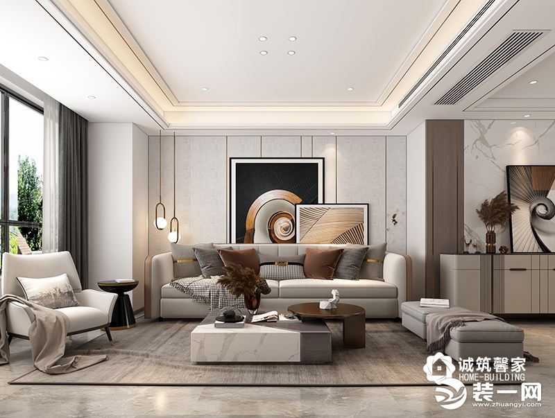 客厅大面积浅灰色硬包以及爵士白背景，让整个空间简洁明了，色彩亮丽的装饰画和皮革包边的沙发 