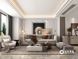 客厅大面积浅灰色硬包以及爵士白背景，让整个空间简洁明了，色彩亮丽的装饰画和皮革包边的沙发 