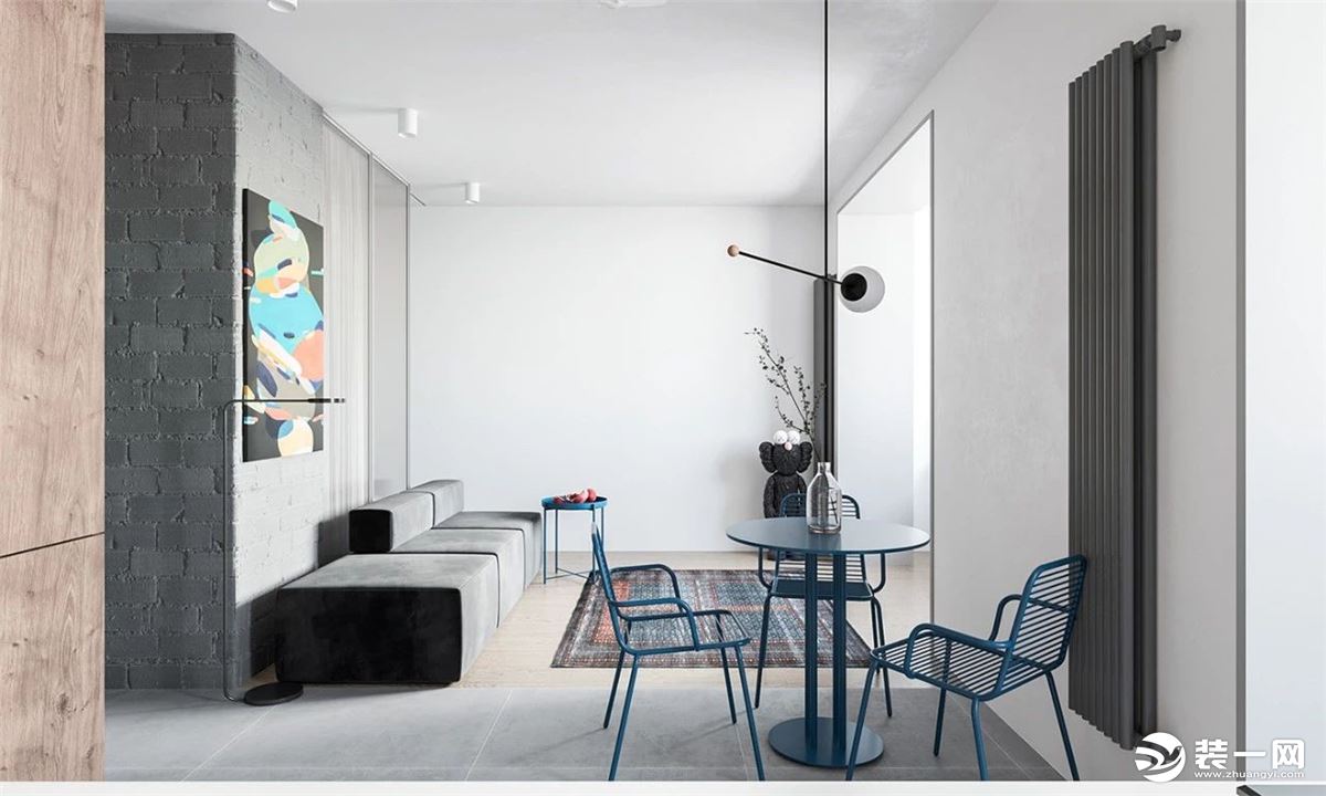 客厅灰色的沙发靠墙摆放  方正的形状也很有立体感 背景墙上的挂画有丰富的色彩