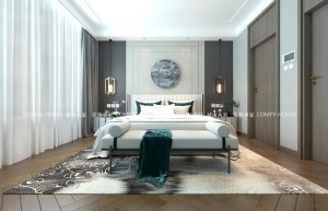 白色作为房间的主体 让室内的光线变得相当的明亮 床头两侧的对称壁灯 让这处空间洋溢着动人的中式美感