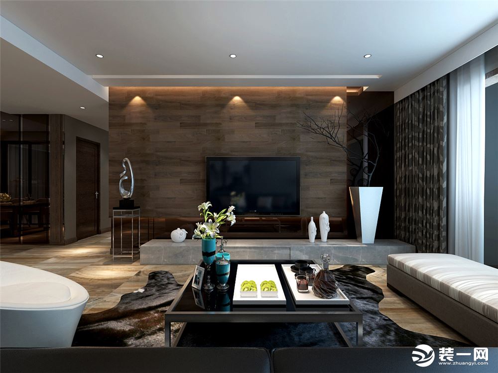 本案的设计主旨意在塑造家的宁静感，所以在色彩搭配上选择客厅的以灰，咖为主调，溶入以驼色，黑色皮质沙发