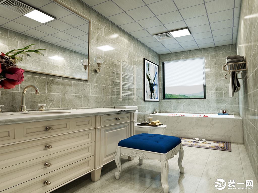 卫生间以灰色砖石铺贴出天然的硬朗，白色橱柜和台面的大比例设计，让生活更为便捷；浴缸之外，挂画的美观与
