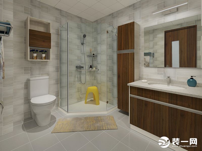 卫生间根据空间的格局，将转角打造成了一个淋浴室，干湿设计更为分明，地垫的铺贴多一份贴心；而灰色系砖石