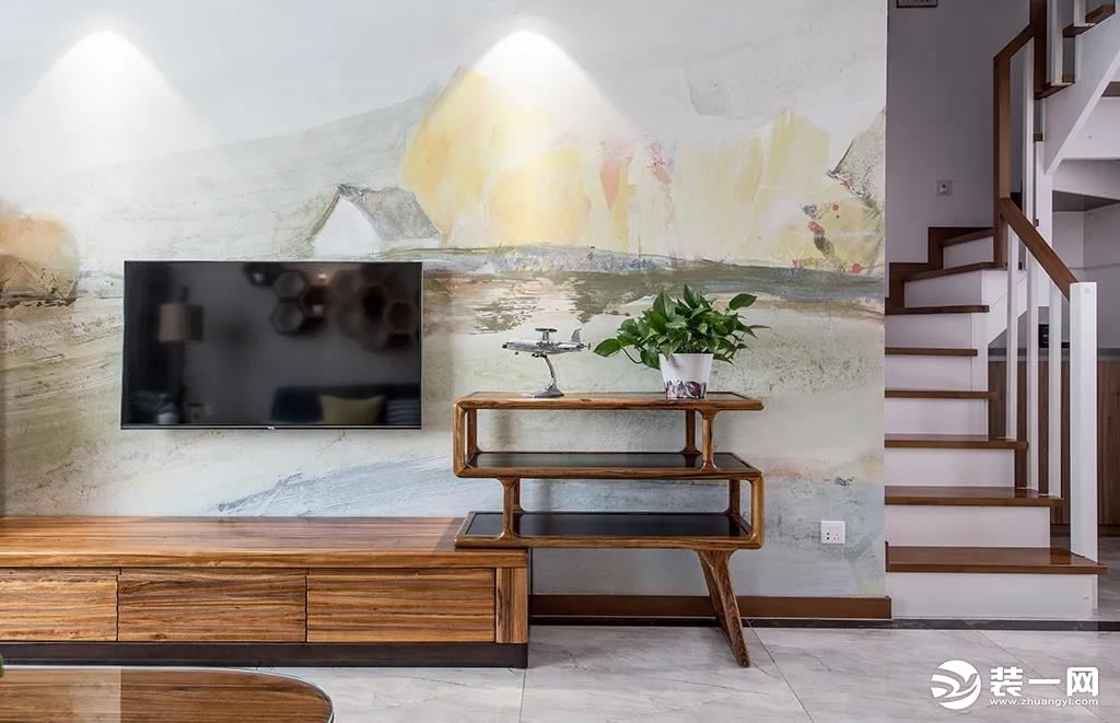 客厅空间以现代风格的基调，搭配自然舒适的木质家具，还有闲适轻松的配色，细致的软装装饰，点缀出一种别样