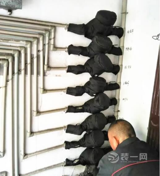 上海供水公司对二次供水接管小区水管水表进行防冻包扎