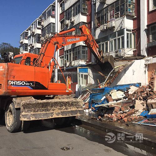 频繁装修楼体存安全隐患 北京某地拆违建并规划复原