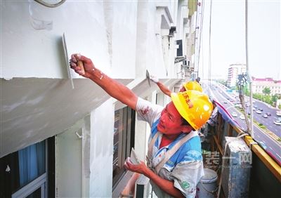 道路实施立面装修严损房排险修缮 系天津河东市容整治