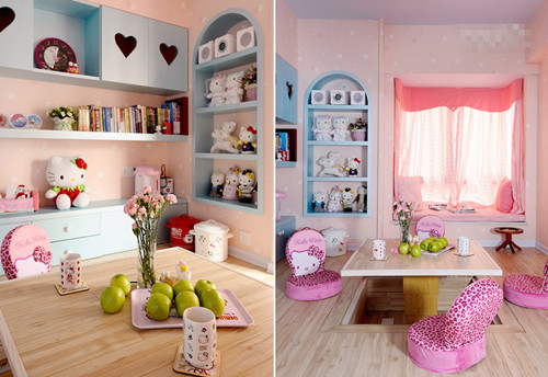 房间是家中的休息室，整体做成了榻榻米的设计，房间进口处的造型设计非常漂亮，是个大大的Hello Kitty图案；整个房间墙壁铺贴了很柔美的淡粉色壁纸，右边靠墙部分做了青色的橱柜，和粉红色进行一下缓冲；中间做了一个长方形的小桌子，平时没人的时候可以将其放下去，聚餐或闲聊时，才将其升起。